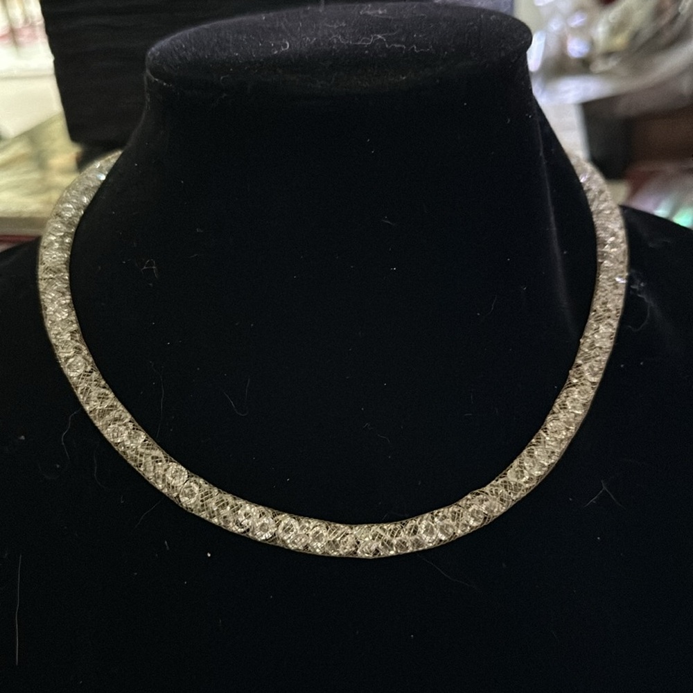 Necklace crystals wrapped in a mesh filled with them beautiful imaginative